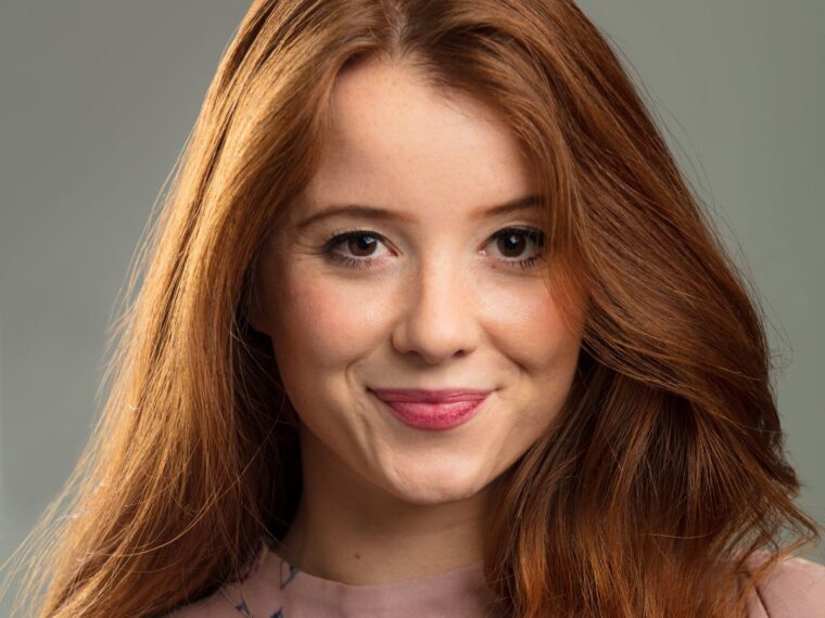 Headshot of a girl with red hair