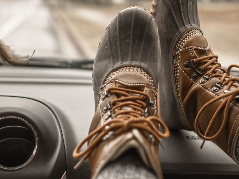 Girl's feet up on the dashboard