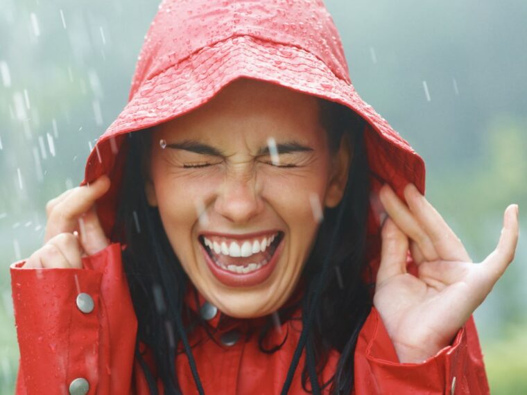 Girl in bucket hat and rain coat
