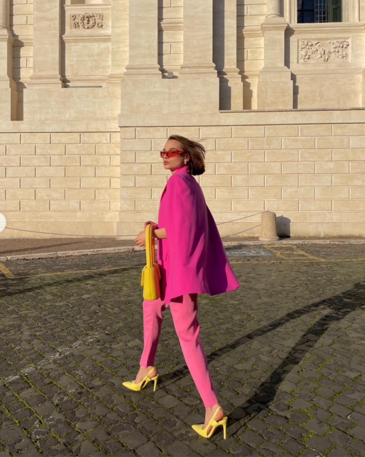 A girl wearing hot pink and neon yellow