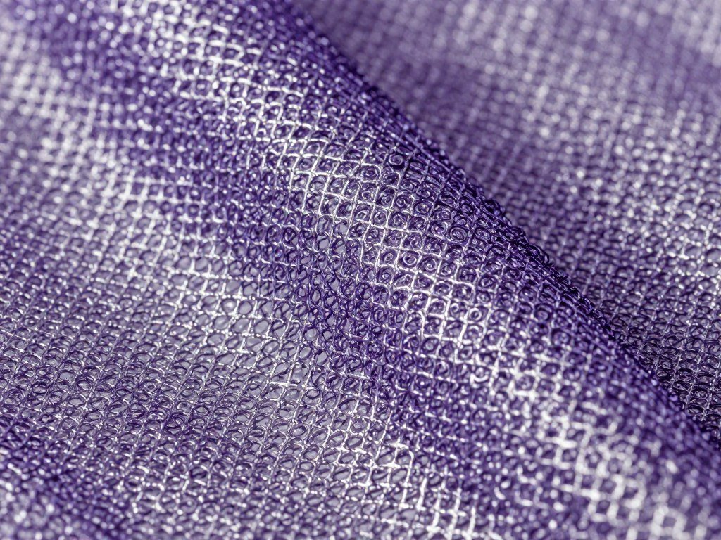 Close up of curly deco mesh material showing texture and curl pattern
