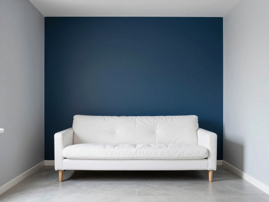 small living room with bold accent wall behind sofa