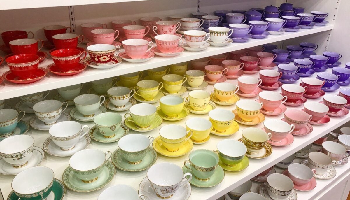 tea cups organized by color creating rainbow gradient display tea cups organized by color creating rainbow gradient display