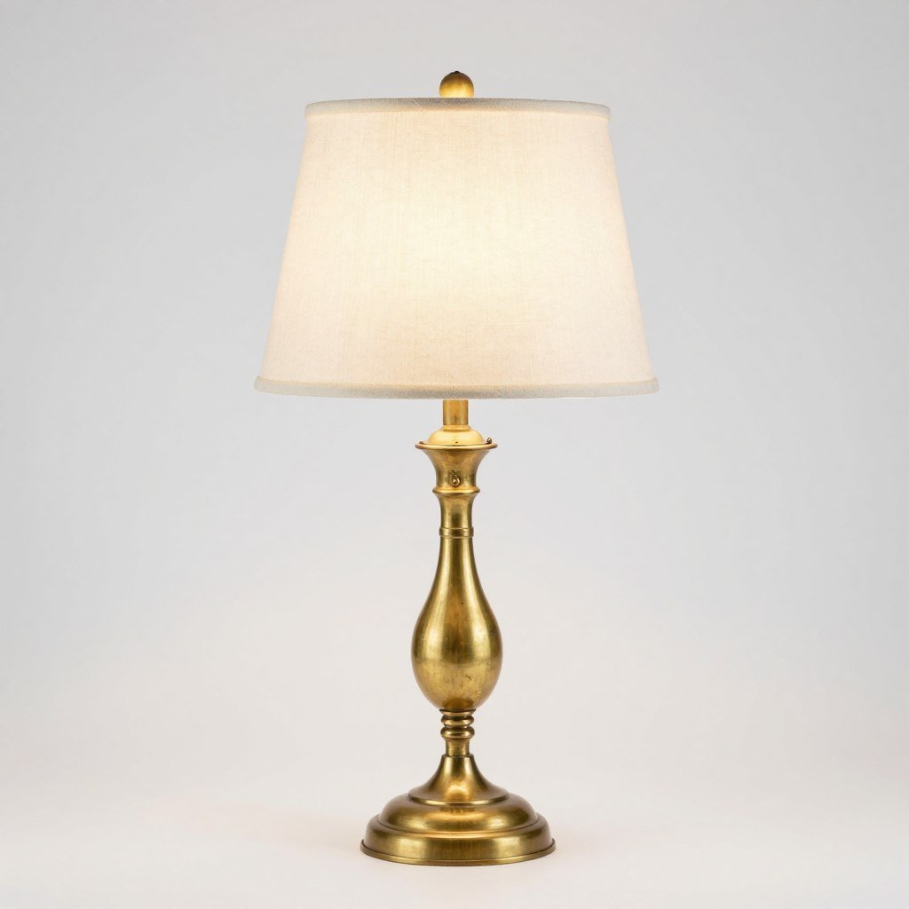 Brass table lamp with cream shade
