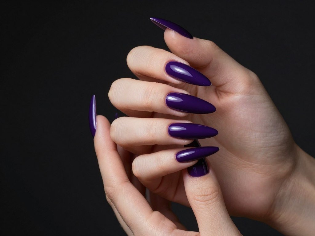 Dramatic violet stiletto-shaped long nails with glossy finish
