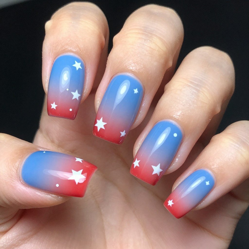 Square nails featuring scattered white stars on red and blue gradient background