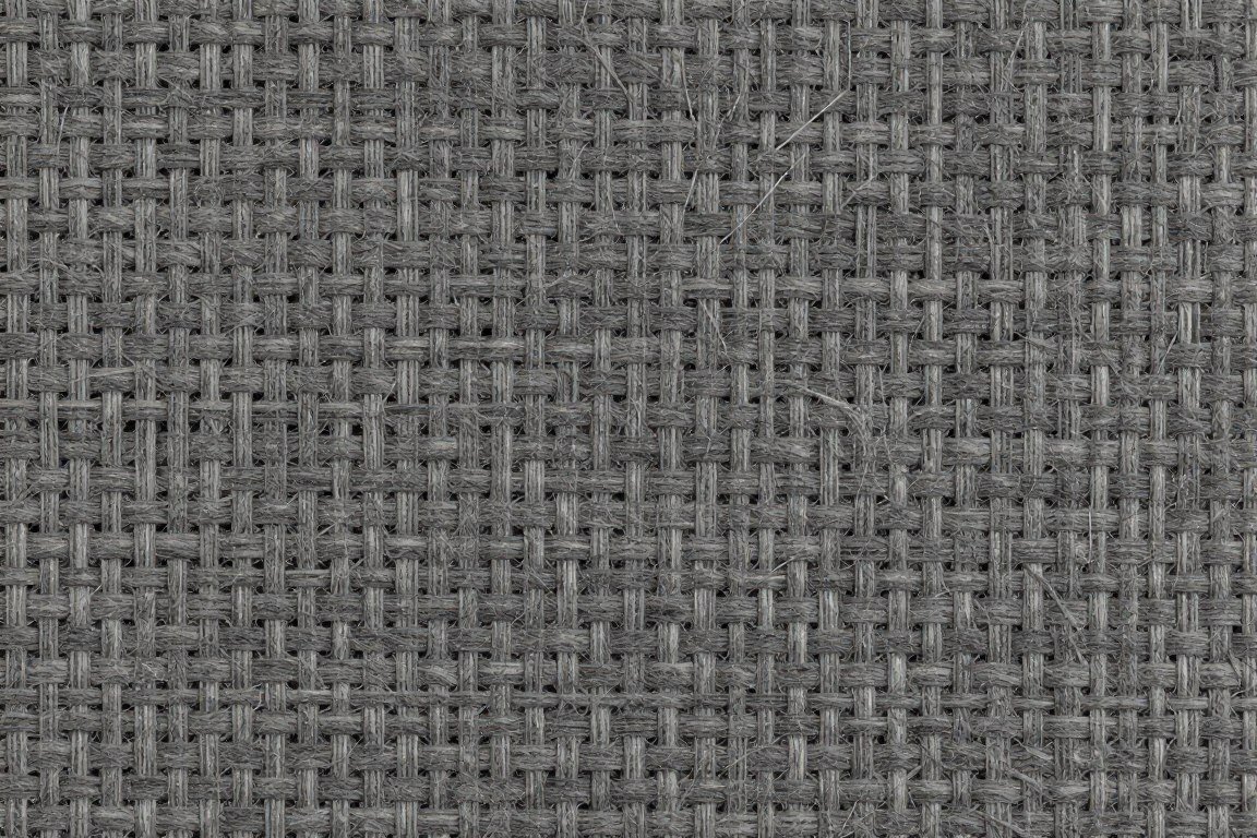 close-up texture detail of charcoal grasscloth wallpaper