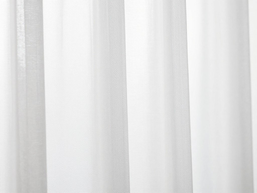 sheer white curtain fabric detail showing translucent quality and light filtering