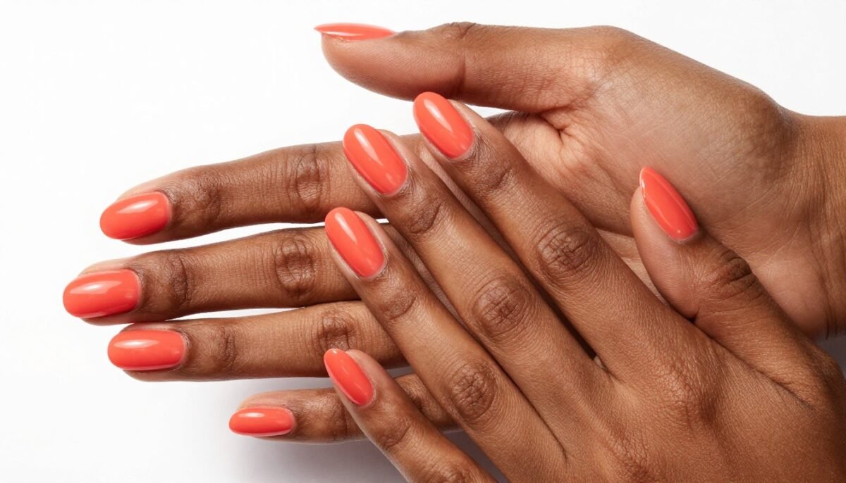 Rich coral shade on deep skin tone Rich coral shade on deep skin tone